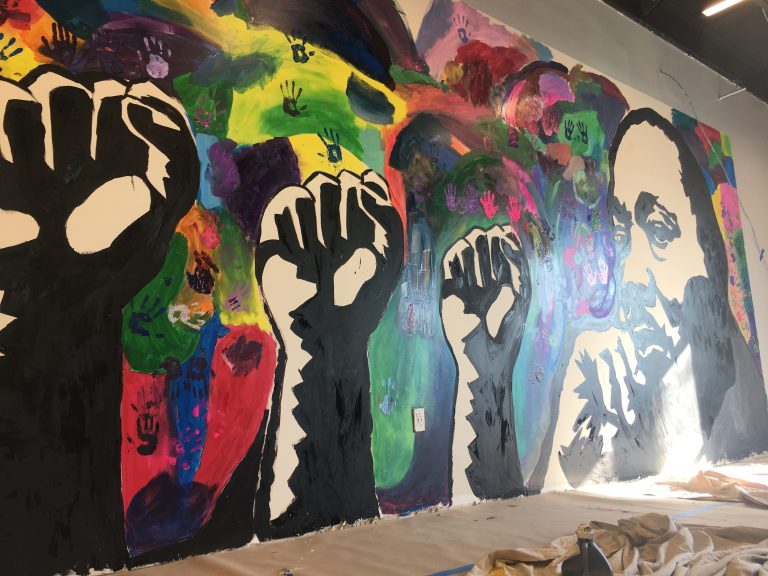 Dozens of students paint new mural honoring MLK in Wilmington